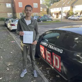 Bild von Phils Red Driving School