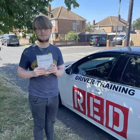 Bild von Phils Red Driving School