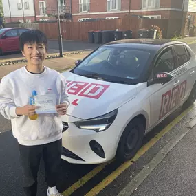 Bild von Phils Red Driving School