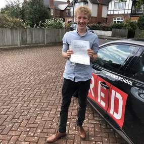 Bild von Phils Red Driving School