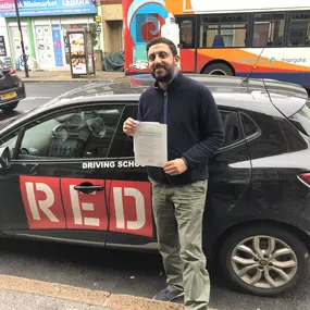 Bild von Phils Red Driving School