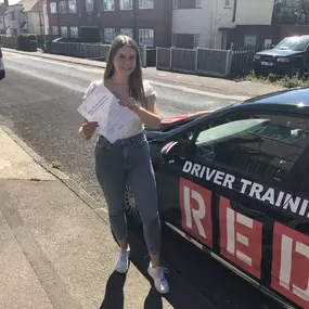 Bild von Phils Red Driving School