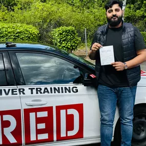 Bild von Phils Red Driving School