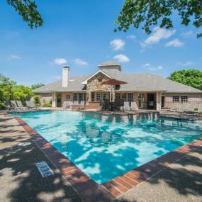 Large swimming pool in front of the building