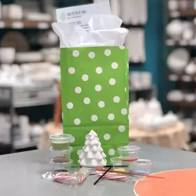 Order one of these Holiday-themed bags for a creative treat!
This paint-at-home project kit includes:
• one mini Tree (3.25