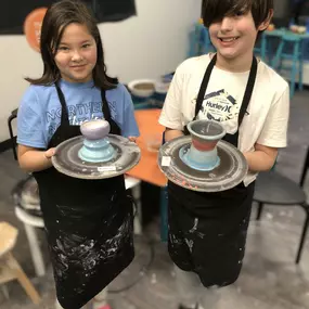 These creative workshops give young students an opportunity
to mold a lump of clay into a bowl, vase or cup on a spinning potter's wheel.
Projects will be decorated with colors the same day! These drop-off classes are for ages 7-15.