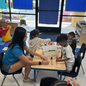 Art + teamwork = masterpiece! Teachers guide kids in expressing themselves through fun, creative art projects.