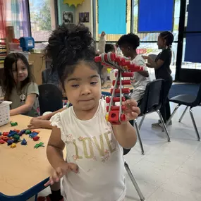 Proud moments of creativity! Kids love sharing their artwork and expressing their imagination.