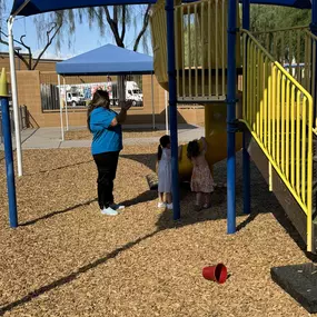 Children laughing and exploring the playground equipment, enjoying an active and adventurous day outside.