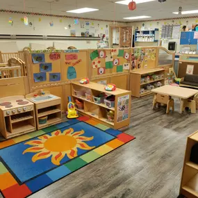A safe, playful space where toddlers can explore, learn, and grow, with nurturing teachers guiding them through new experiences and fun activities.