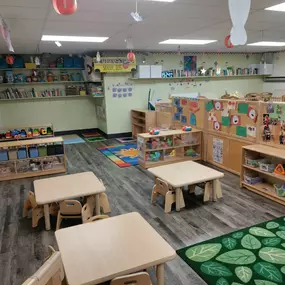 A safe, playful space where toddlers can explore, learn, and grow, with nurturing teachers guiding them through new experiences and fun activities.