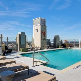 Rooftop saline pool with resort inspired lounge.