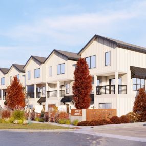 Outside Rendering of Alpine Landing with red trees and manicured foliage