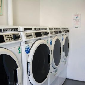 Laundry room at Brookwood at Bay Shore