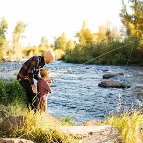 Father and son fishing, like activities found near new construction homes in Heber City, Utah