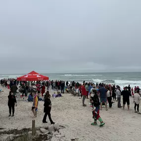 Had the privilege of handing out coffee and donuts to the surfers and surfing Santa! - Ryan Hill State Farm Insurance Agent Palm Bay call for a free car insurance, home, or life insurance quote