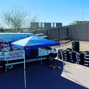 Freedom Tire Guys Arizona and their mobile van with their stock of new tires ready to be put on