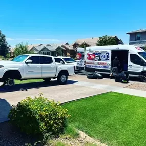 Mobile tire service being provided to a customer outside of their house by Freedom Tire Guys Arizona