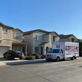 Freedom Tire Guys Arizona performing a mobile tire job at a customers house providing new tires and a tire change