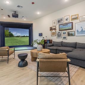 golf simulator and lounge at the links at pga parkway