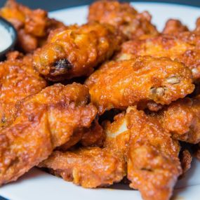 Hot Wings from Yellow Submarine in Nags Head. Choose from Boneless or Regular with Hot, Mild, BBQ, Honey BBQ, or Garlic Parmesan sauce. Served with homemade Buttermilk Ranch or Blue Cheese.