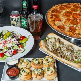 Pepperoni Pizza, Fresh Salad, Philly Cheesesteak, and our original Rip Curls available at Yellow Submarine in Nags Head at the Outer Banks Mall.