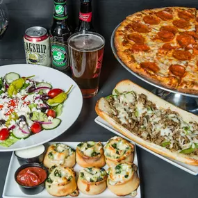 Pepperoni Pizza, Fresh Salad, Philly Cheesesteak, and our original Rip Curls available at Yellow Submarine in Nags Head at the Outer Banks Mall.