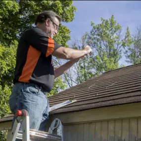 NewRuf Contractor Inspecting Roof