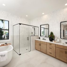 Private primary bathrooms offer ample space and dual vanity sinks