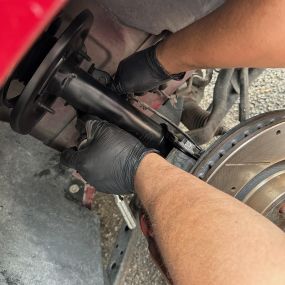 Auto Mechanic working on tools