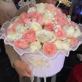 Compton Flower Shop - Light pink and white roses in a bucket
