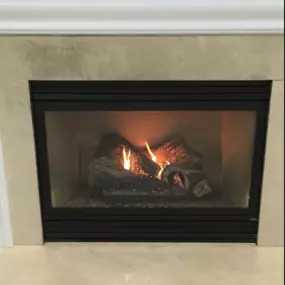 Experience the charm of a traditional fireplace with the convenience of gas logs. Our gas fireplace features realistic logs that glow and flicker, adding warmth and ambiance to your space with the flip of a switch.