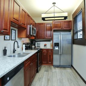 Sunset Park kitchen has stainless steel appliances