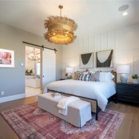 Spacious primary bedroom suites with plenty of natural light