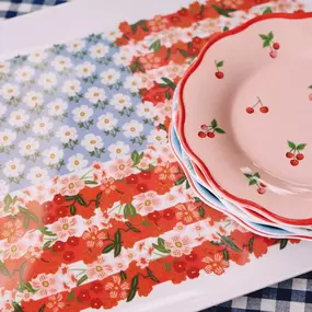 Rifle Paper fans take note: we still have some great pieces from the sold out Americana collection in our Bath and Yarmouth gift shops! The berry floral flag is such a pretty and unique design, lovely on this baseball cap and these perfect, lightweight melamine plates and trays!