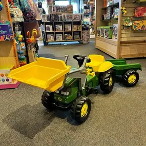 Our John Deere Kid Tractor With Trailer is still in stock! This outdoor mini tractor is an amazing summer toy for kids 3-7! Come test drive it today, it won’t be here for long! •