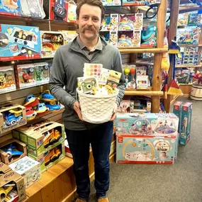 Look who stopped by! It's Sam, our owner, making sure your Easter baskets are filled with the best toys around. Sam's got a knack for filling our shelves with a carefully curated, handpicked selection you won't find anywhere else.
