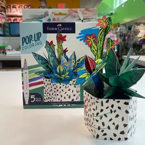 ????This plant is guaranteed to survive a black thumb! ????
Both a construction and craft project, the first step is to color in the die-cut paper succulent and vase pieces - the 5 double-sided markers allow for both broad strokes and fine line work. Once colored in, just assemble the pieces to see the bouquet come to life. Perfect as a desk accessory or get well gift!