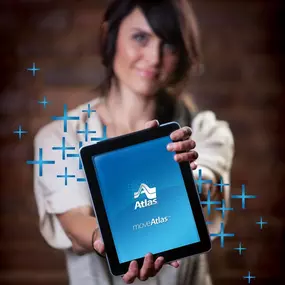 Woman holding Atlas tablet