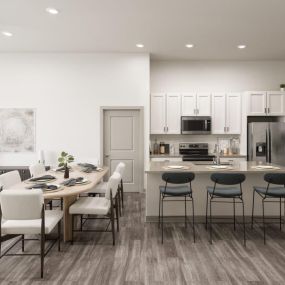 Kitchen and dining room with a large table and chairs