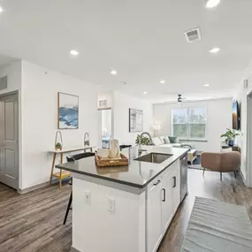 Living room and kitchen with isle