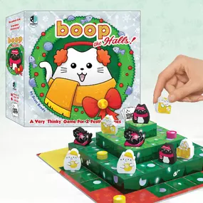 Deceptively cute, deceivingly challenging.  The boop the Halls! Game is a purr-fect festive strategy game for 2 cat-loving players, similar gameplay to the original boop game but the challenge is literally elevated!  The board is shaped like a multi-level tree and ornament tokens get placed on the 