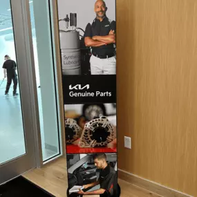 Interior signage at Jeff Wyler Kia of Colerain indicating the Parts Department, where customers can purchase genuine Kia OEM parts, replacement components, and accessories in Colerain near Cincinnati.