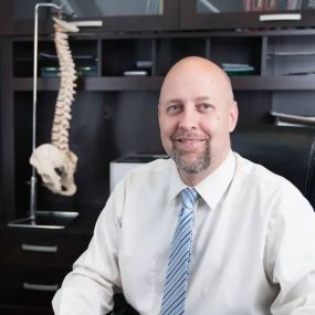 Doctor Christopher Bennett is a chiropractor at Orion Family Spinal Center in Lake Orion