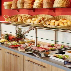 Breakfast bakery and cold cuts assortment