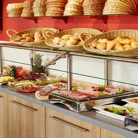 Breakfast bakery and cold cuts assortment