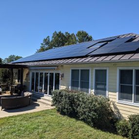 Roof-mounted solar panels on a metal roof, near Charlottesville, VA