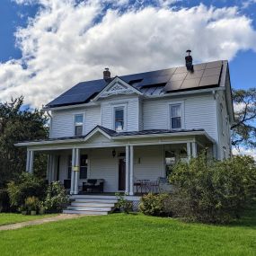 Beautiful residential solar array, installed on a standing-seam metal roof, with no penetrations.