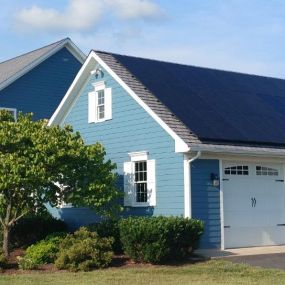 All-black residential solar panels, installed on a garage, by Virtue Solar