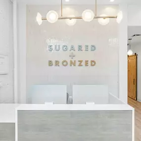 SUGARED + BRONZED Upper West Side reception desk